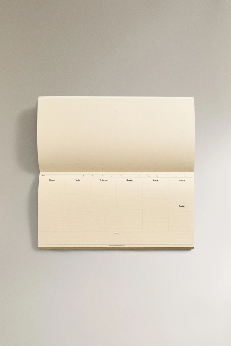 WEEKLY PLANNER WITH GOLD RIMS