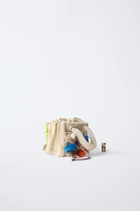 SAC BANDOULIÈRE EN PEAU DE MOUTON CHARM