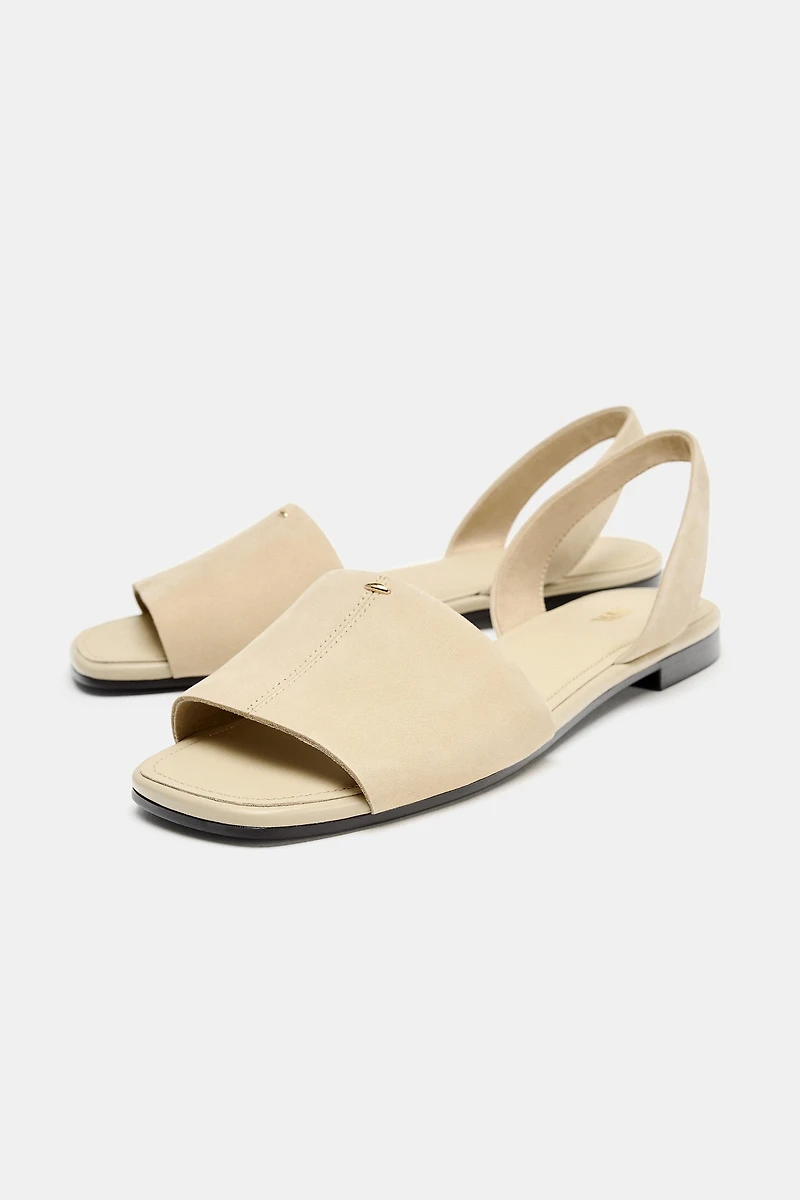 SANDALES PLATES EN CUIR À BRIDES