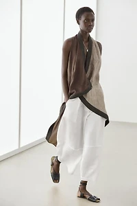 Flowing wrap top with mixed fabric detail
