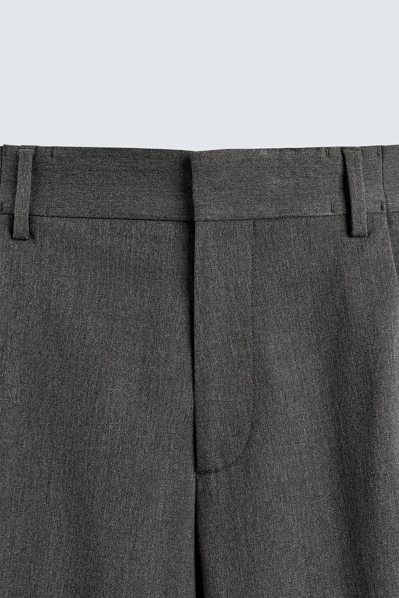 PANTALON COUPE LARGE À PLIS