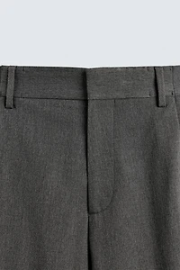 PANTALON COUPE LARGE À PLIS