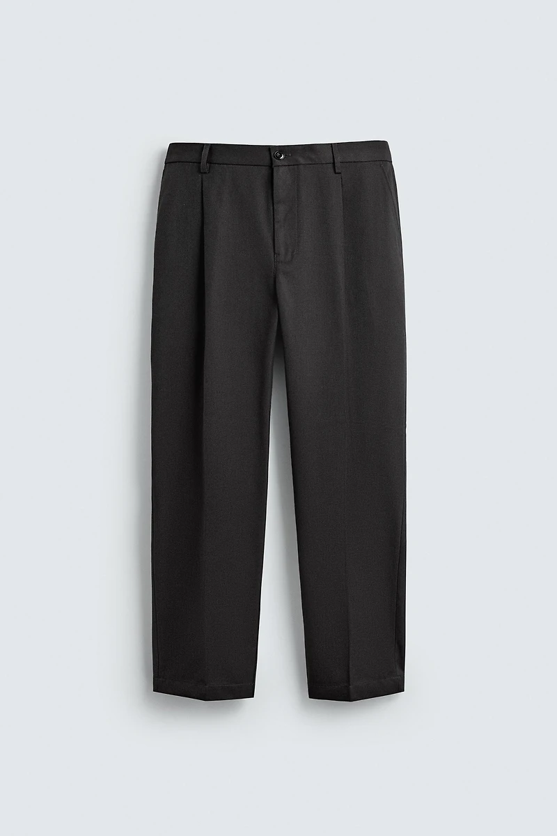 TEXTURED PLEATED PANTS