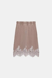 WASHED EFFECT SKIRT WITH LACE TRIM