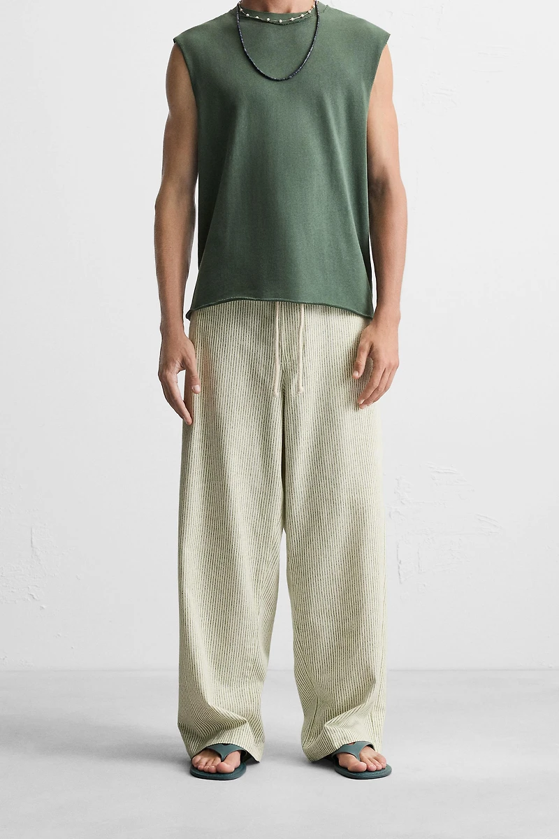 STRIPED BAGGY FIT PANTS