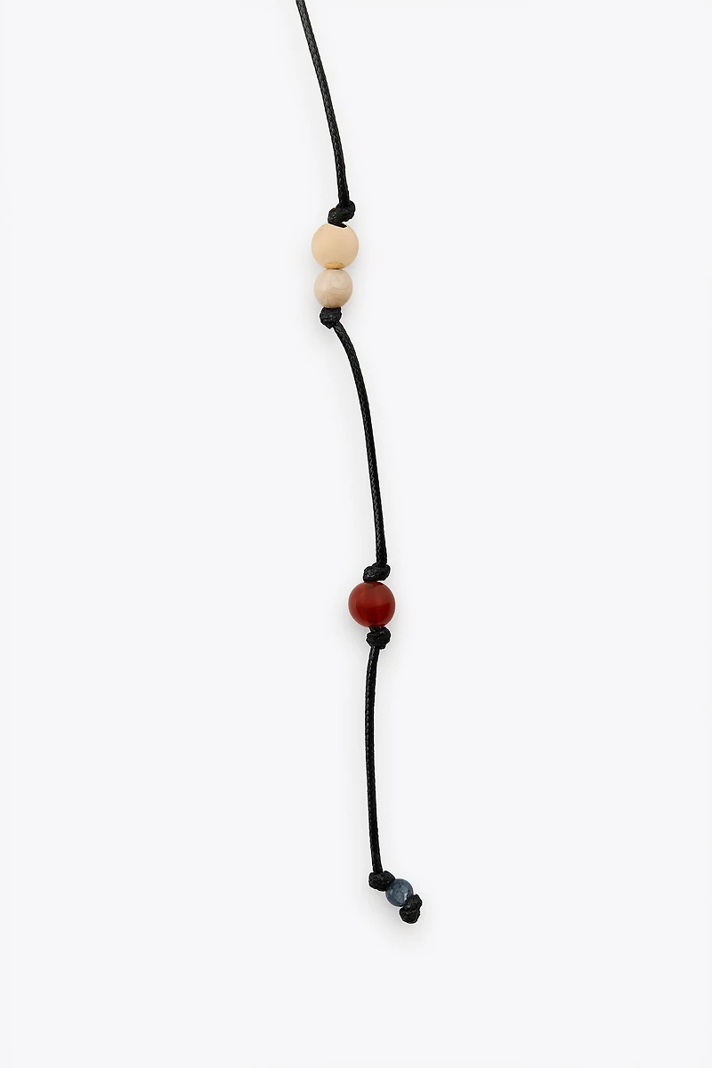 MULTI-WAY BEADED CHARM CORD NECKLACE