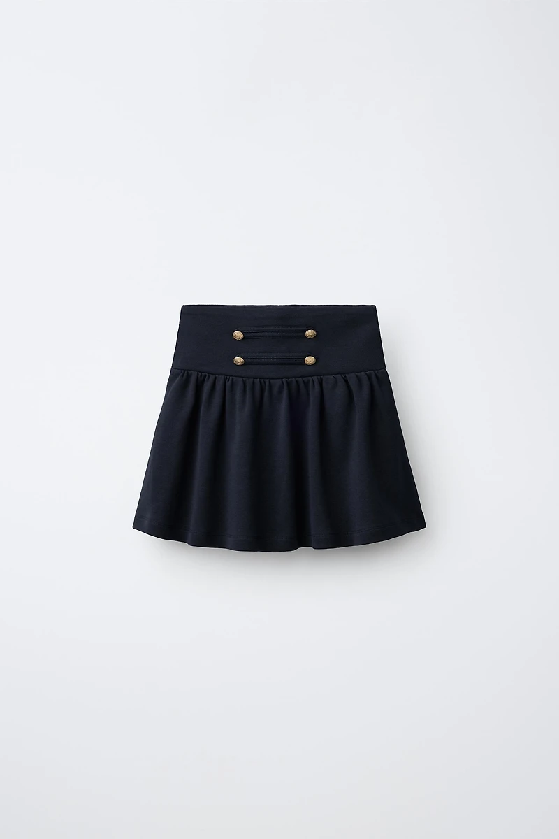 FROG FASTENING AND BUTTON SKIRT