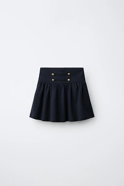 FROG FASTENING AND BUTTON SKIRT