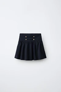 FROG FASTENING AND BUTTON SKIRT