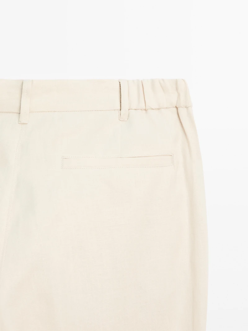 100% linen tapered fit trousers