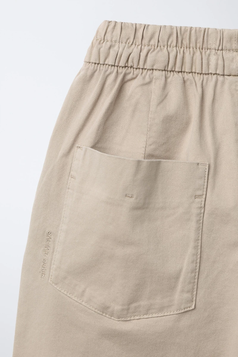PANTALON BALLON À PLIS