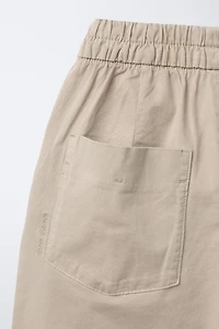PANTALON BALLON À PLIS