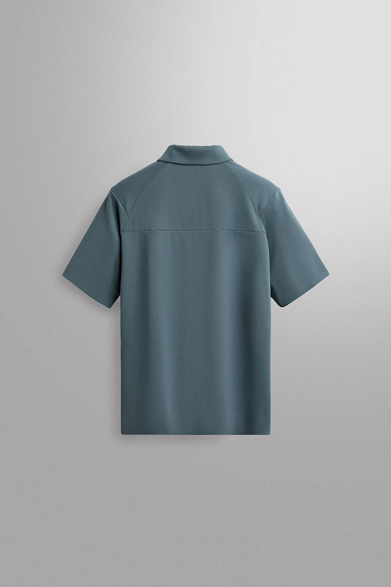 TECHNICAL PIQUÉ TRAINING POLO