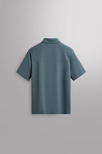 TECHNICAL PIQUÉ TRAINING POLO