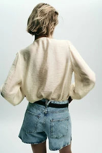 BLOUSE ROMANTIQUE À VOLANTS