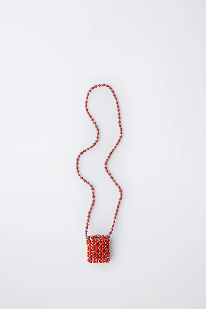 LONG BEADED NECKLACE