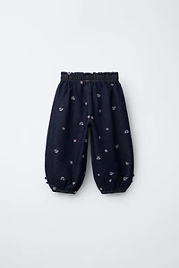 EMBROIDERED FLORAL BALLOON JEANS