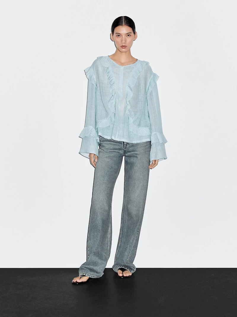 Flowing blouse with ruffles