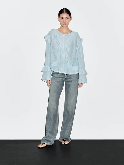 Flowing blouse with ruffles