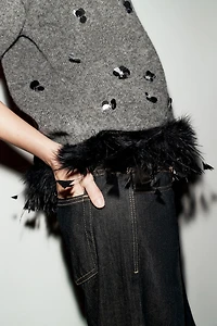 WOOL SWEATER WITH SEQUINS AND FEATHERS