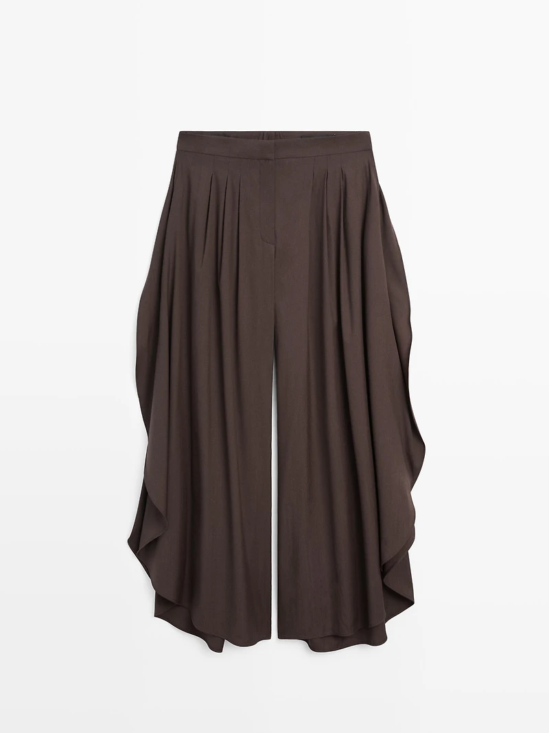Pantalon large plissé à fentes latérales