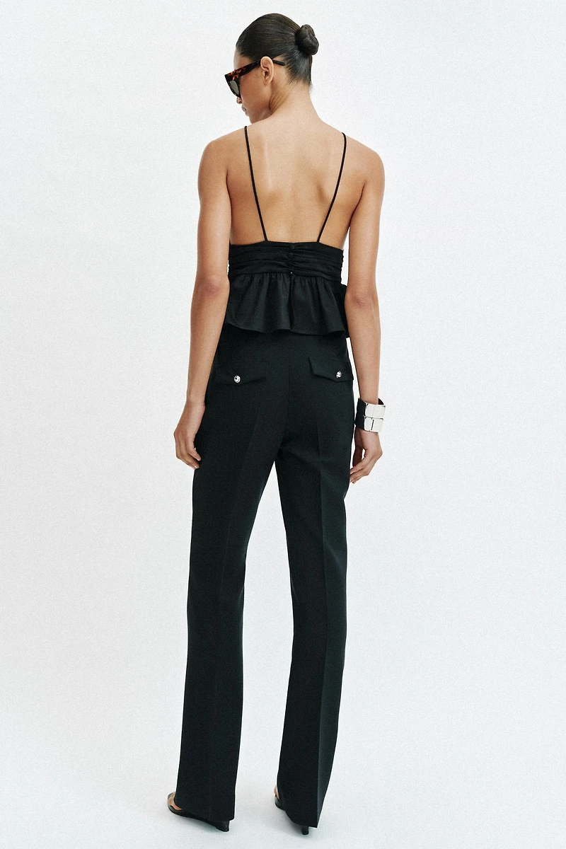 PANTALON FLARE À BOUTONS