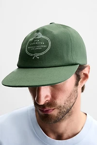 CASQUETTE DÉLAVÉE AVEC IMPRIMÉ COMBINÉ