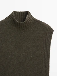 Sleeveless high neck sweater