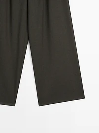 Wide-leg trousers with darts and elasticated waistband