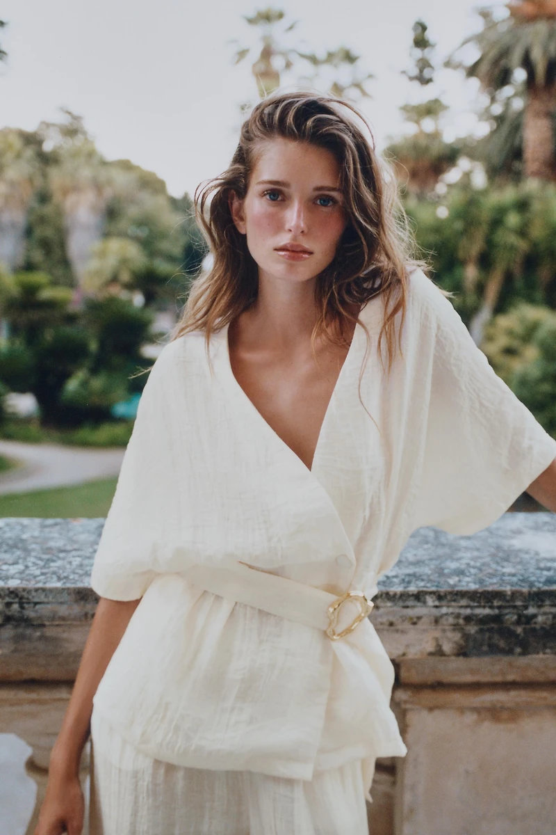 BELTED TOP WITH BUCKLE