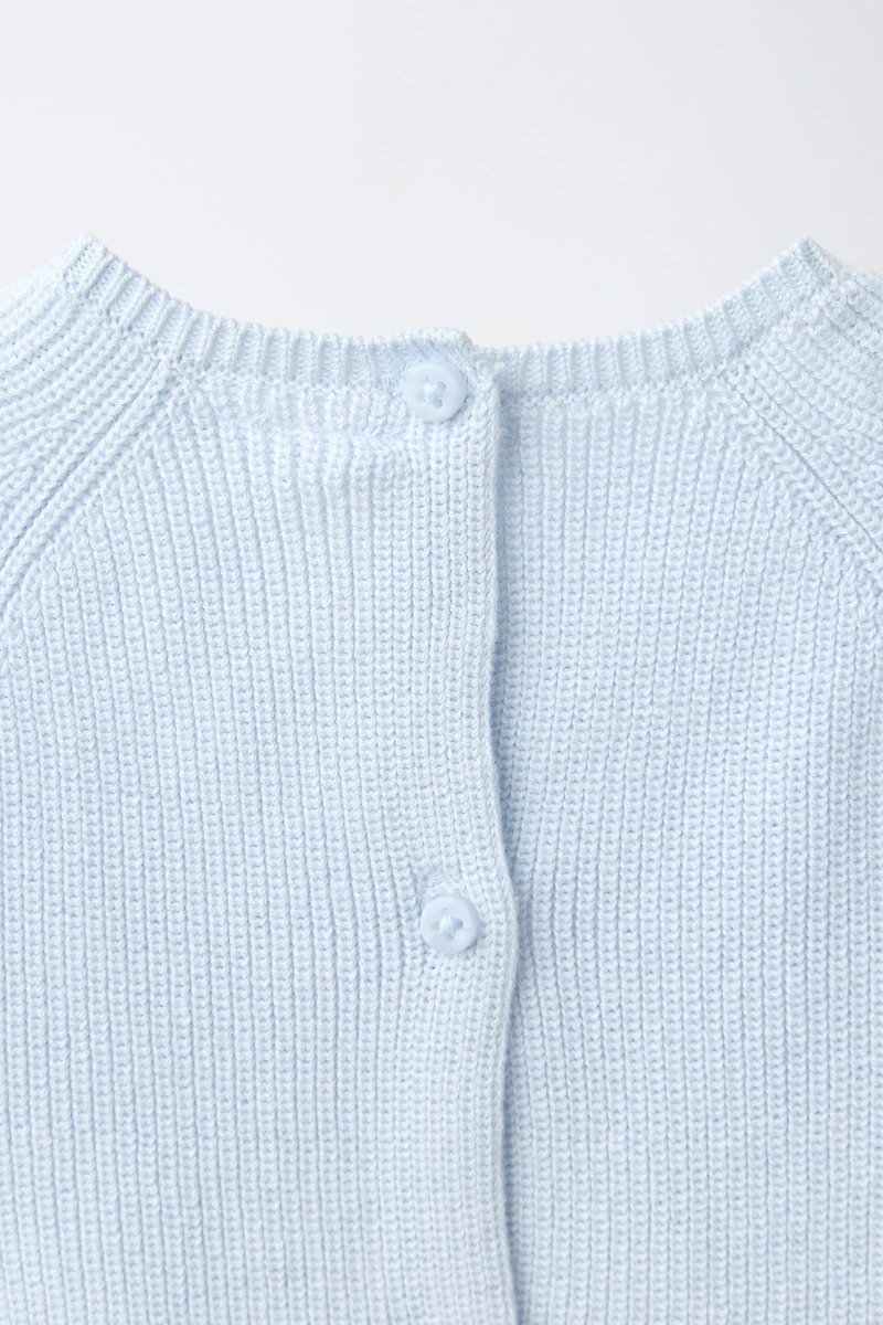 PULL EN MAILLE AVEC PIÈCE CHIOT