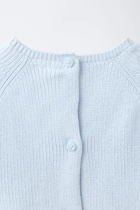 PULL EN MAILLE AVEC PIÈCE CHIOT