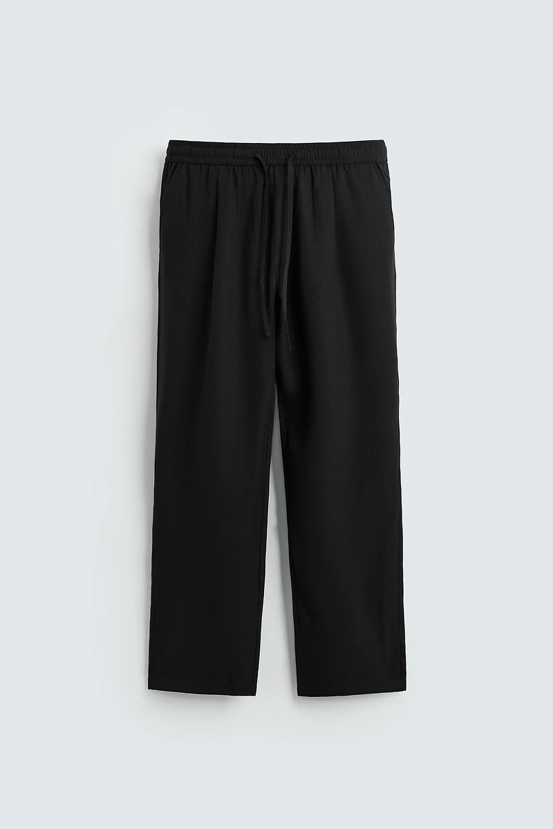 RELAXED FIT FLOWY PANTS