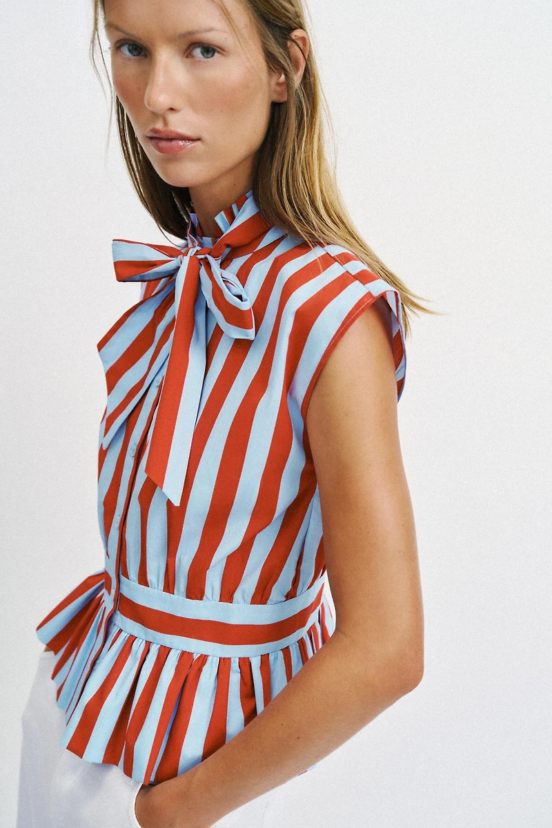 STRIPED KNOTTED SLEEVELESS SHIRT