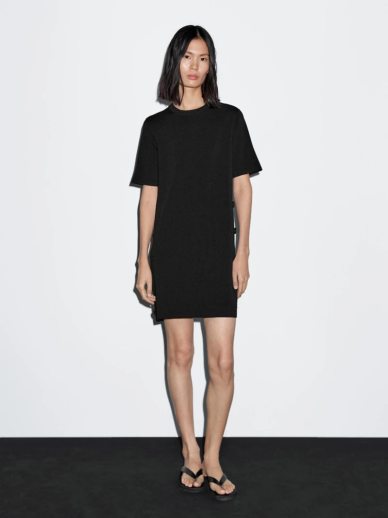 Short knit dress with side button details