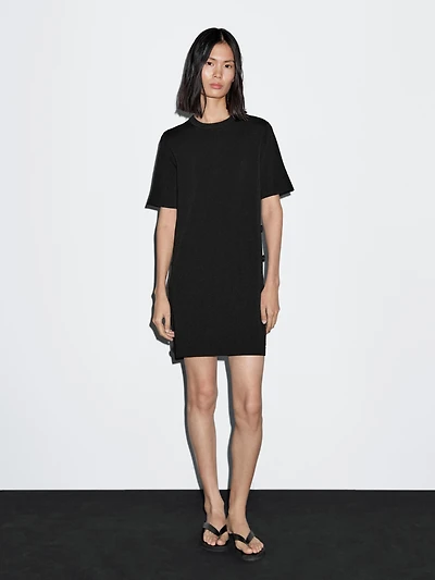 Short knit dress with side button details