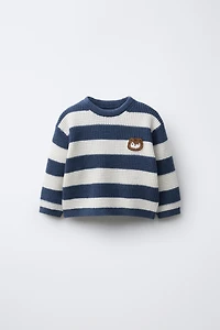 WAFFLE KNIT SQUIRREL PATCH SWEATER