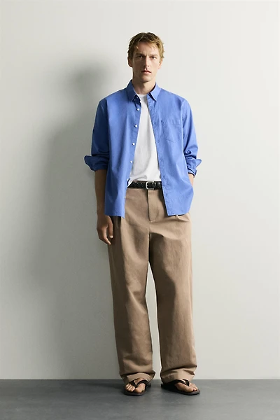 RELAXED FIT PLEATED PANTS