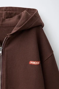 SWEAT ZIPPÉ PUKAS SURF