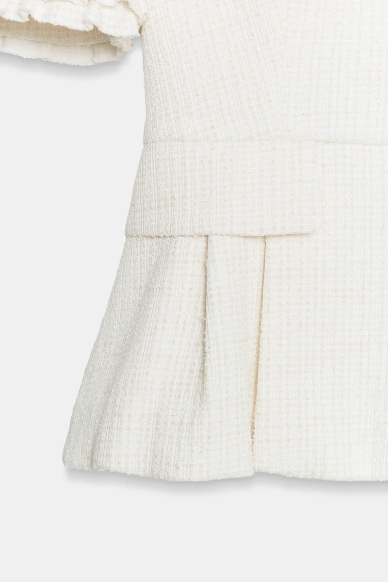 VESTE PEPLUM À VOLANTS ET MANCHES COURTES