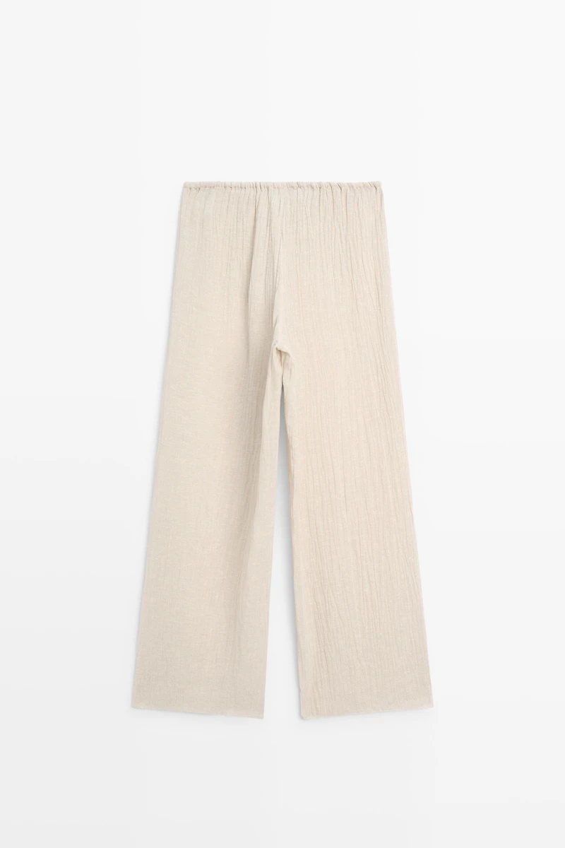 Total look flowing waffle-knit linen blend trousers