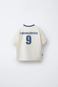 TEXT AND FLORAL PRINT T-SHIRT