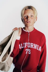 TEXT JOGGING SWEATSHIRT