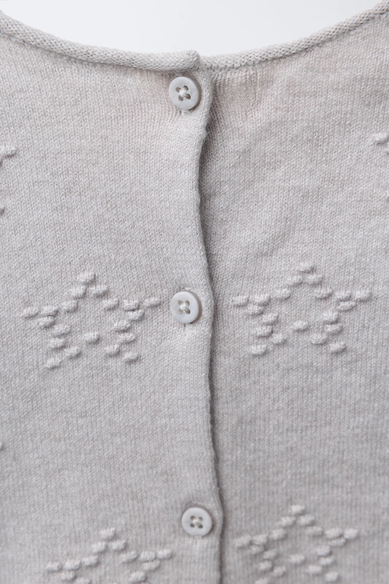 COMBINAISON LONGUE EN MAILLE AVEC ÉTOILES BRODÉES