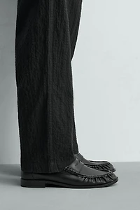 Mocassins chic à masque