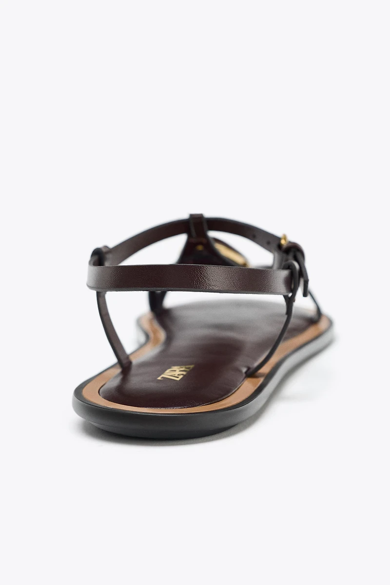 SANDALS WITH METALLIC APPLIQUÉ