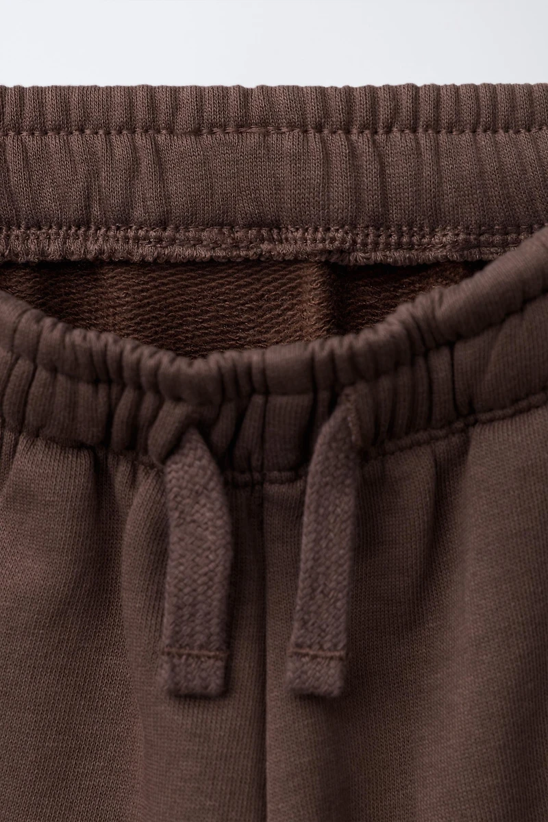 EMBROIDERED ANIMAL NUMBER JOGGING PANTS