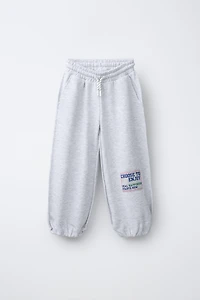 RELAXED RAW EDGE JOGGER PANTS
