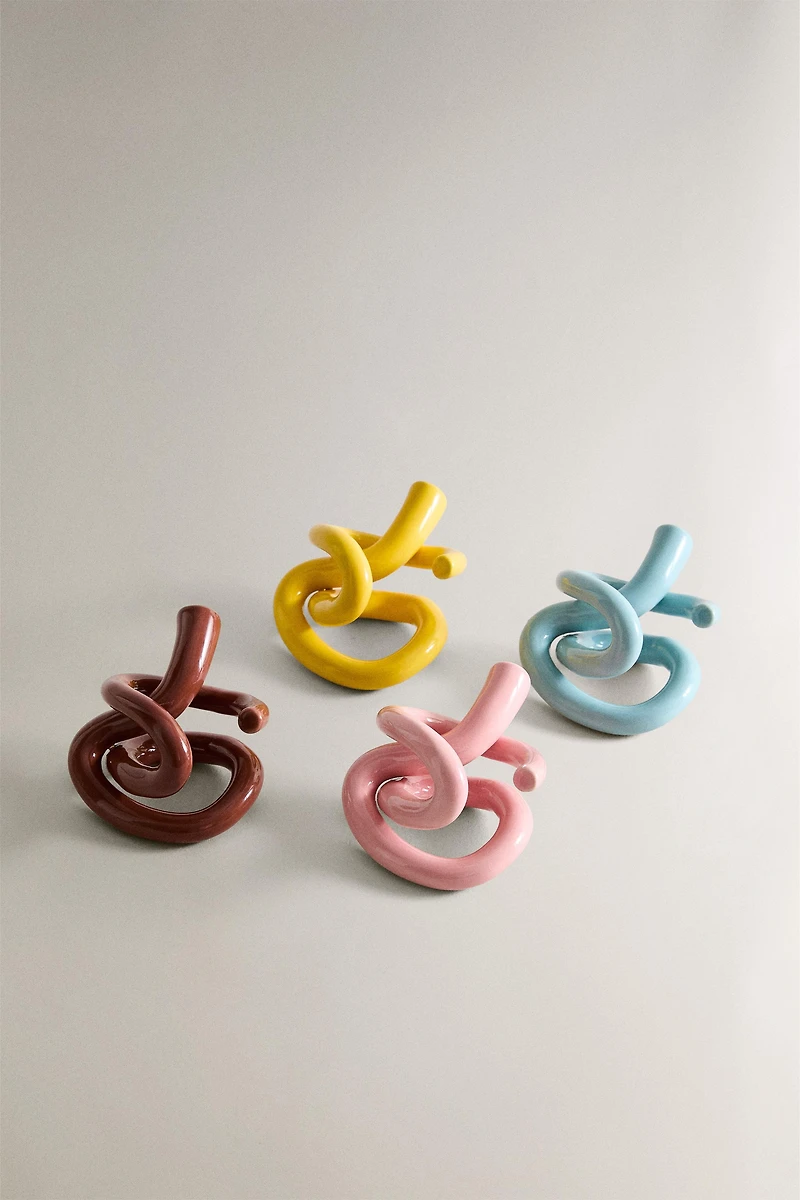 SET OF TEXTURED CERAMIC NAPKIN RINGS (SET OF 4) X COLLAGERIE