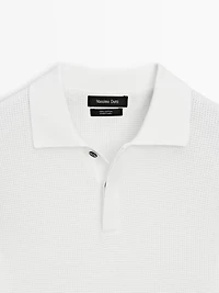 Polo en maille texturée de coton